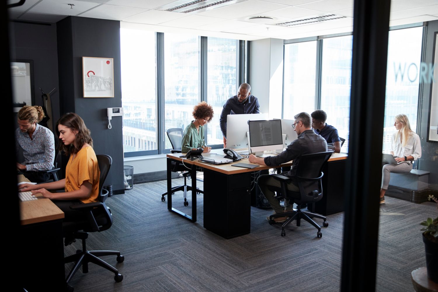 people working in an office together